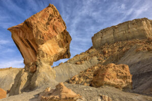 A balancing act involving a huge boulder within the Kaiparowitz Plateau, near Lake Powell, Arizona