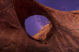 This composite view of sandstone and Milky Way in the Navajo country of Monument Valley is accessible only by Navajo guide.