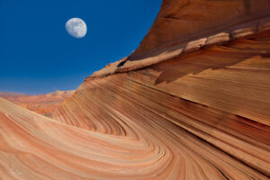 A composite photograph of the moon over the Wave.