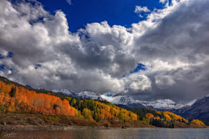 This high mountain lake near Silverton, Colorado displays all of the elements of a late fall landscape. Clouds, color and snow.