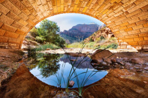 An enchanting scene under a bridge on the Mt Carmel highway in Zion National Park