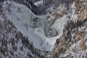 The upper Yellowstone Falls are completely frozen over during the late winter period of February.