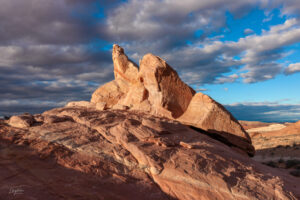 These rocks are blazing in the last vestiges of sunlight and reflect a nice contrast and texture. These rocks are located just next to the Fire Wave Trailhead in the Valley of Fire.